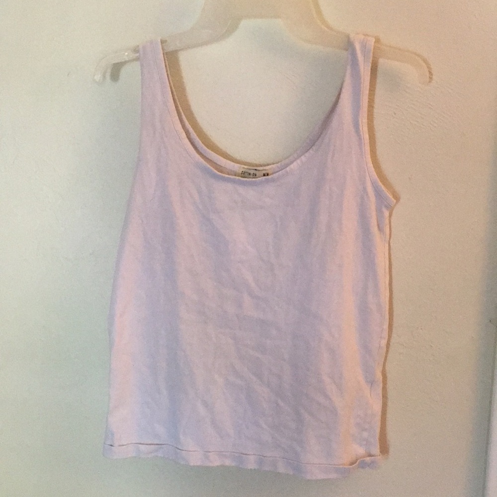 Plain white tank top from cotton on. Never worn